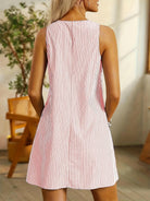 Blue Allison™ sleeveless striped dress by Lumina Vancouver, lightweight and stylish for warm weather.
