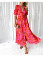 Red and pink Alva elegant V-neck puff sleeve maxi dress by Lumina Vancouver, displayed on a model.