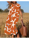 Black Alvina Relaxed Abstract Dress by Lumina Wear, featuring a loose fit and modern abstract print.