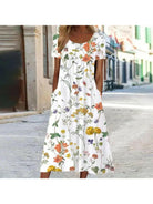 Alya elegant boho floral maxi dress with tummy coverage in red, featuring flowing fabric and floral pattern from Lumina Vancouver.