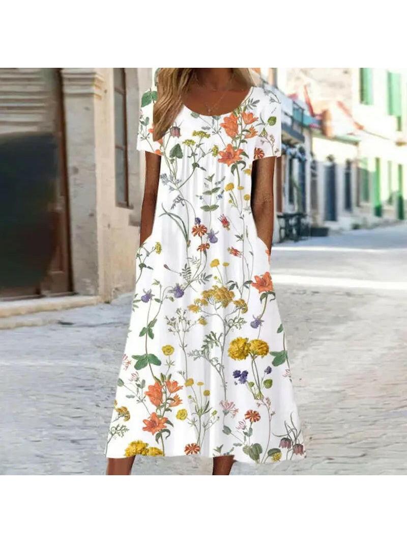 Alya elegant boho floral maxi dress with tummy coverage in red, featuring flowing fabric and floral pattern from Lumina Vancouver.