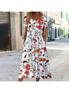 Alya elegant boho floral maxi dress by Lumina Vancouver, featuring tummy coverage and flowing red fabric.