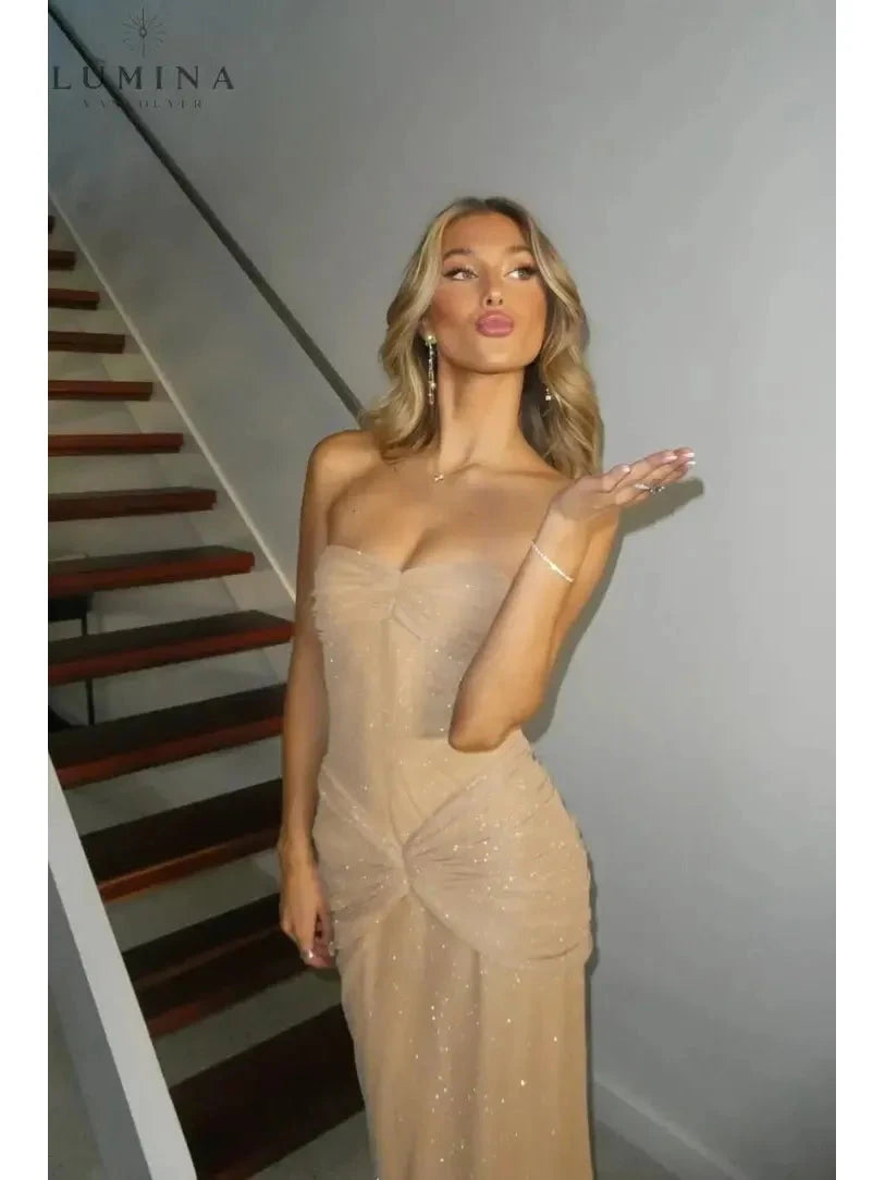 Girls night out in a Lumina Vancouver Amalia shimmer fishtail maxi dress, featuring a fitted silhouette and elegant design.