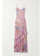 Amanda wearing a pink lightweight sleeveless maxi dress by Lumina Vancouver, flowing and elegant for warm weather.