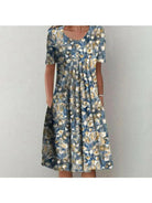 Red floral printed dress by Lumina Vancouver, Violette Classic style, featuring a fitted silhouette and elegant design.