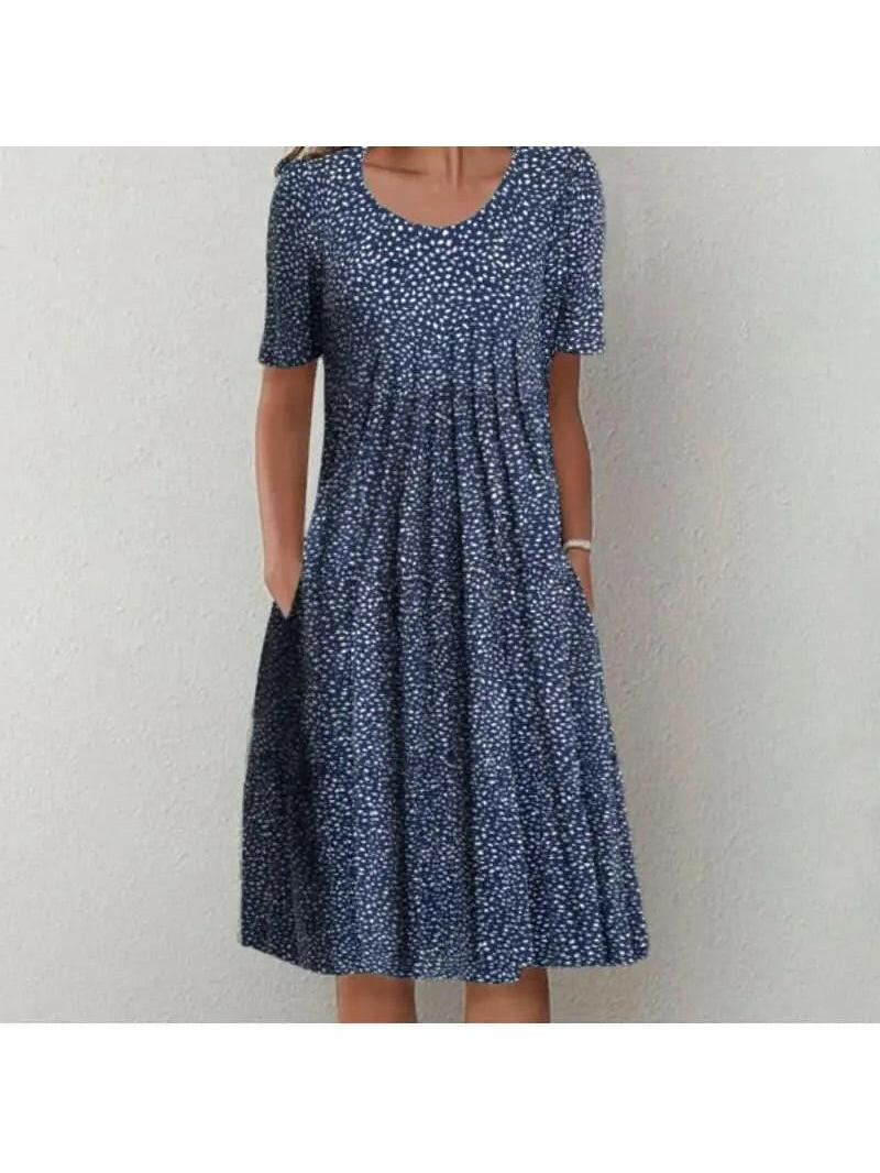 Red floral printed dress called Violette by Lumina Vancouver, featuring a classic design and elegant fit.