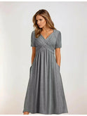 Black Amara evening gown by Lumina Wear, elegant dress with flowing fabric perfect for formal events.