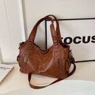 Amber black shoulder handbag by Lumina Wear featuring sleek design and functional compartments.