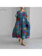 Lumina Vancouver Amelia floral dress with colorful flower pattern, showcasing a lightweight, stylish summer dress on a model.