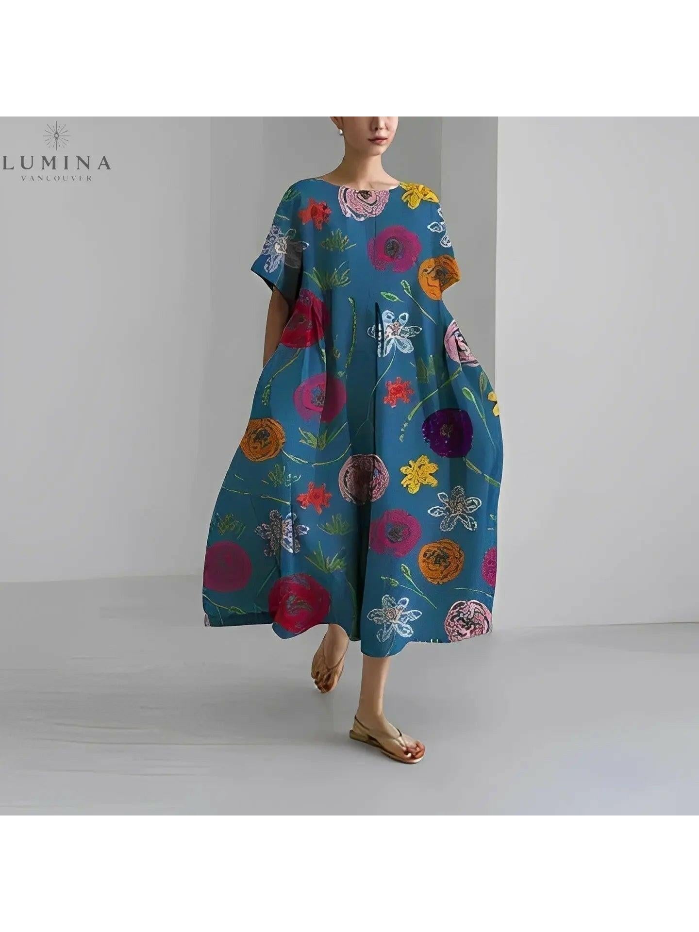 Lumina Vancouver Amelia floral dress with colorful flower pattern, showcasing a lightweight, stylish summer dress on a model.