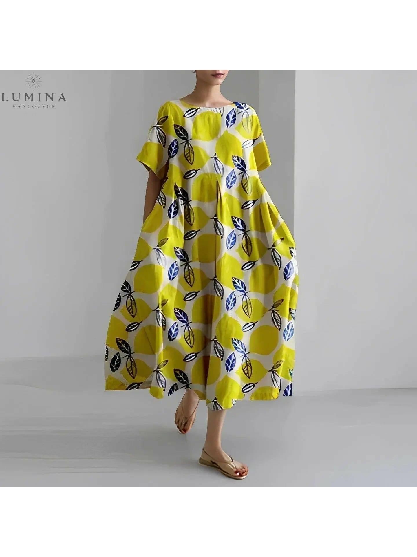 Lumina Vancouver Amelia floral dress with vibrant flower print, lightweight fabric, and elegant fit perfect for spring and summer wear.