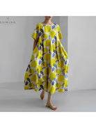 Lumina Vancouver Amelia floral dress with vibrant flower print, lightweight fabric, and elegant fit perfect for spring and summer wear.