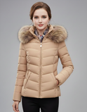 Black Lumina Wear Amelia longline puffer coat with faux-fur hood, sleek design, lightweight and warm for winter.