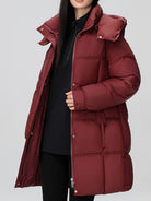Black Amelia Lumina Wear hooded longline puffer coat with belt, stylish and warm winter outerwear, XS size.