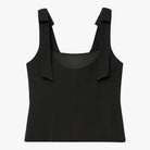 Black Amelie Lumina Wear camisole with elegant bow detail and zipper closure, shown on a white background.
