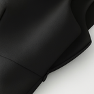 Black Lumina Wear Amelie camisole with bow detail and zipper closure, stylish and elegant women's sleeveless top.