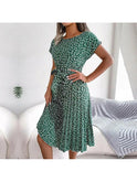 Lumina Wear Anabelle floral pleated midi dress in blue, featuring a flowy design and elegant style, perfect for summer occasions.