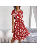 Blue Anabelle floral pleated midi dress by Lumina Wear, featuring a flowy design and elegant midi length.