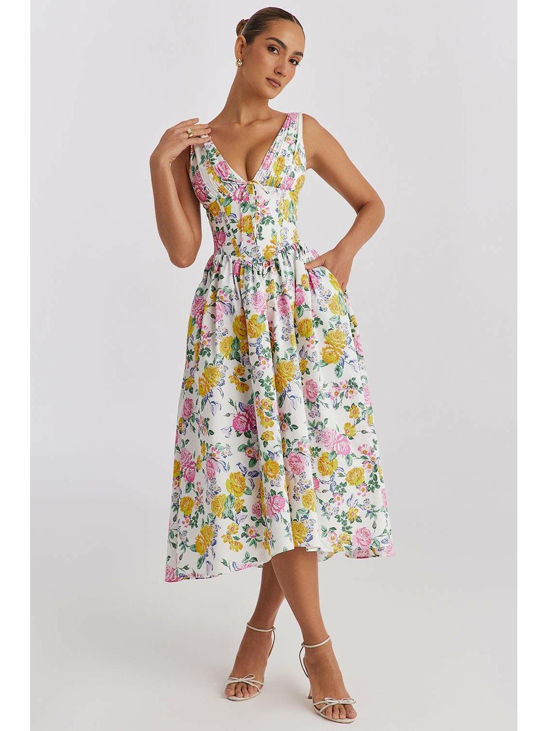 Yellow floral summer dress by Lumina Wear with a flowing silhouette and elegant design, perfect for warm-weather occasions.
