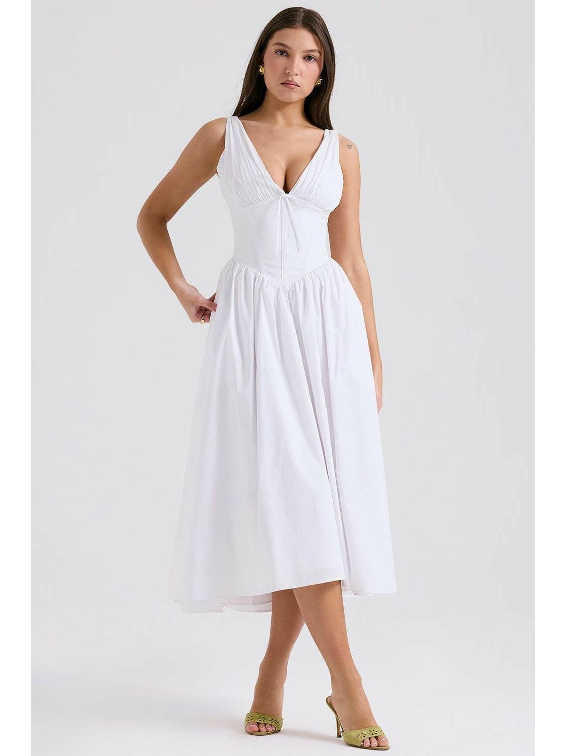 Yellow floral Angelica elegant summer dress by Lumina Vancouver, lightweight fabric with a flattering fit and stylish design.