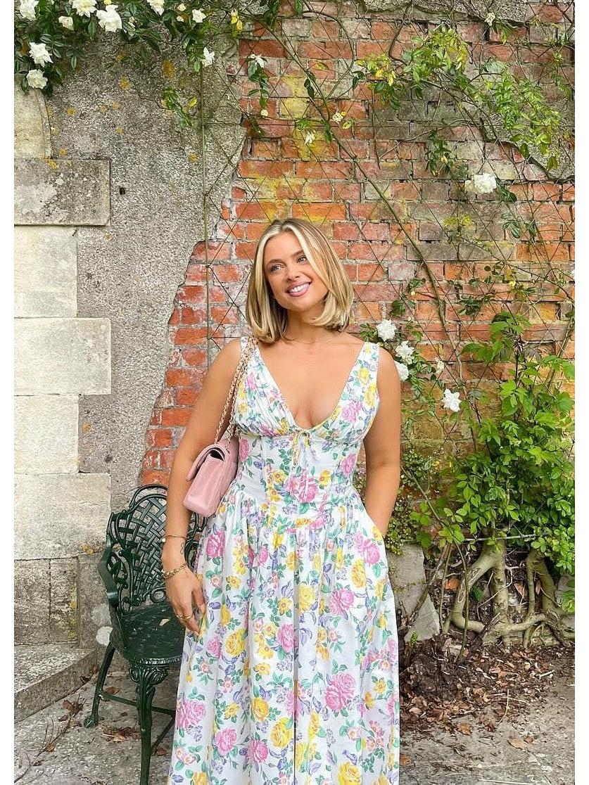Yellow floral Angelica elegant summer dress by Lumina Vancouver, featuring a flowing design and lightweight fabric.