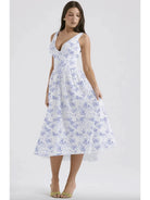 Yellow floral Angelica summer dress by Lumina Vancouver, featuring an elegant design and lightweight fabric for warm weather.