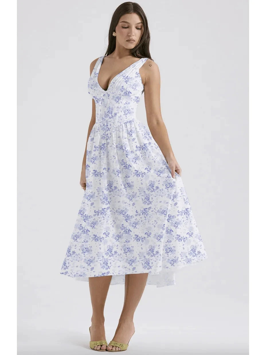 Yellow floral Angelica summer dress by Lumina Vancouver, featuring an elegant design and lightweight fabric for warm weather.