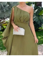 Green Araluen one-shoulder pleated dress by Lumina Vancouver, showcasing a stylish, elegant design with flowing fabric.