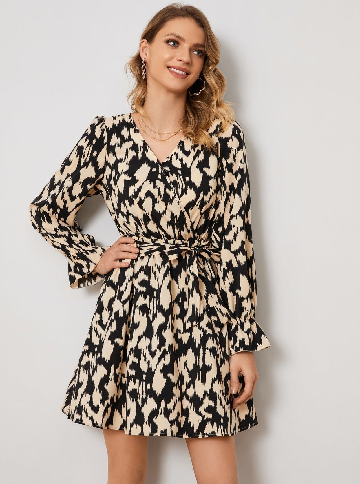 Lumina Wear Raili A-Line Mini Dress with V-Neck, stylish short dress in soft fabric, perfect for casual and semi-formal occasions.
