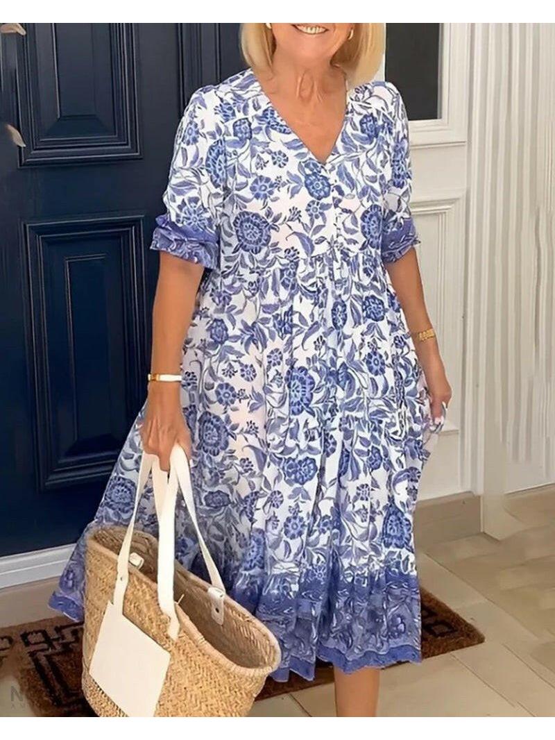 Blue ARIA™ floral dress with V-neck from Lumina Vancouver, elegant design perfect for stylish occasions.