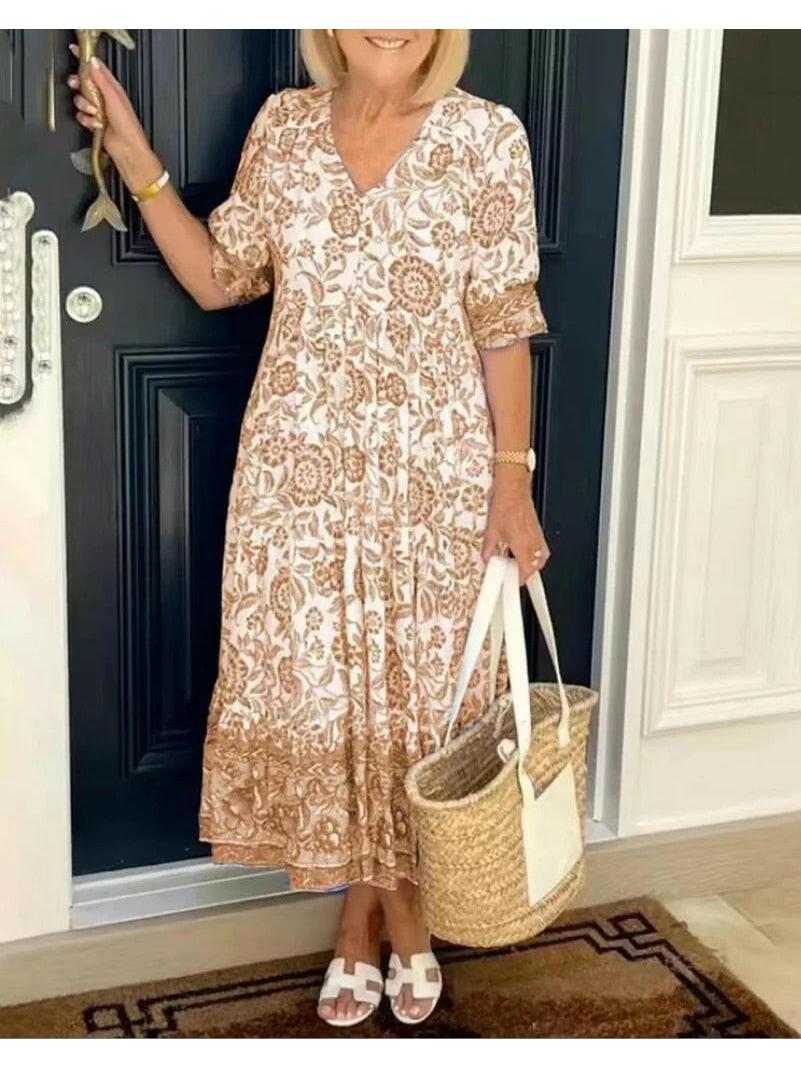 Elegant blue floral dress with V-neck from Lumina Vancouver, featuring a stylish and feminine design.