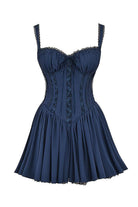 White mini dress by Lumina Vancouver featuring a lace-trimmed bodice and short sleeves, styled on a mannequin.