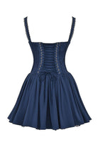White mini dress with lace-trim bodice by Lumina Vancouver, featuring a fitted silhouette and delicate lace details.