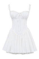 White mini dress by Lumina Vancouver with lace-trim bodice and short sleeves, featuring a fitted silhouette and delicate detailing.
