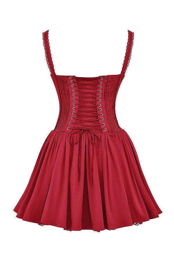 White mini dress by Lumina Vancouver featuring a lace-trimmed bodice and a fitted silhouette.