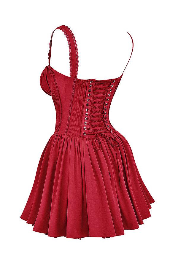 White mini dress by Lumina Vancouver featuring a lace-trimmed bodice and short sleeves, displayed on a hanger.