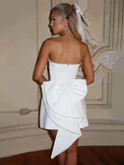 White strapless satin mini dress by Lumina Vancouver, style Anneli, featuring a sleek, fitted design perfect for elegant occasions.