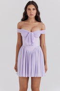 Lavender purple off-shoulder mini dress with bow front by Lumina Wear, featuring a stylish and feminine design.