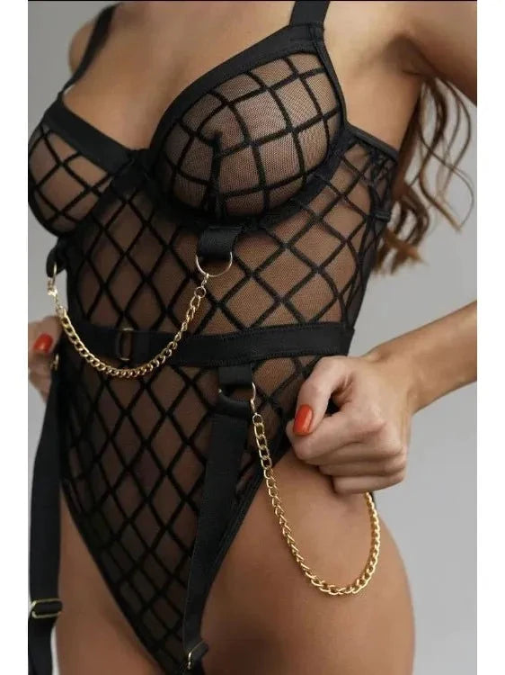 Lumina Wear Tellervo Bodysuit in black, form-fitting with long sleeves, displayed on a mannequin.