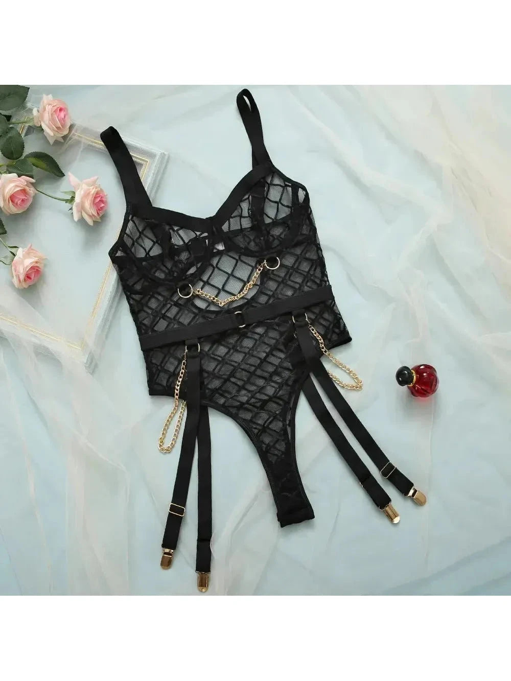 Lumina Vancouver Tellervo Bodysuit, form-fitting black bodysuit with sleek design, shown on a model.