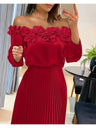 Red off-shoulder maxi dress by Lumina Vancouver featuring flowing fabric and elegant design.
