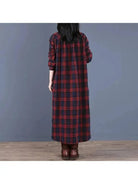 Red grid-pattern Arianna medium-length shirt dress by Lumina Vancouver, displayed on a hanger with a casual, stylish look.