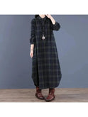 Red grid-patterned Arianna medium-length shirt dress by Lumina Wear, featuring a collar, button front, and rolled-up sleeves.