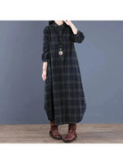 Red grid-pattern Arianna medium-length shirt dress by Lumina Vancouver, featuring a classic collar and button front.
