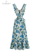 Orange Ariella floral ruffle dress for girls, featuring holiday vibes, by Lumina Vancouver, suitable for ages 4-6 XS.