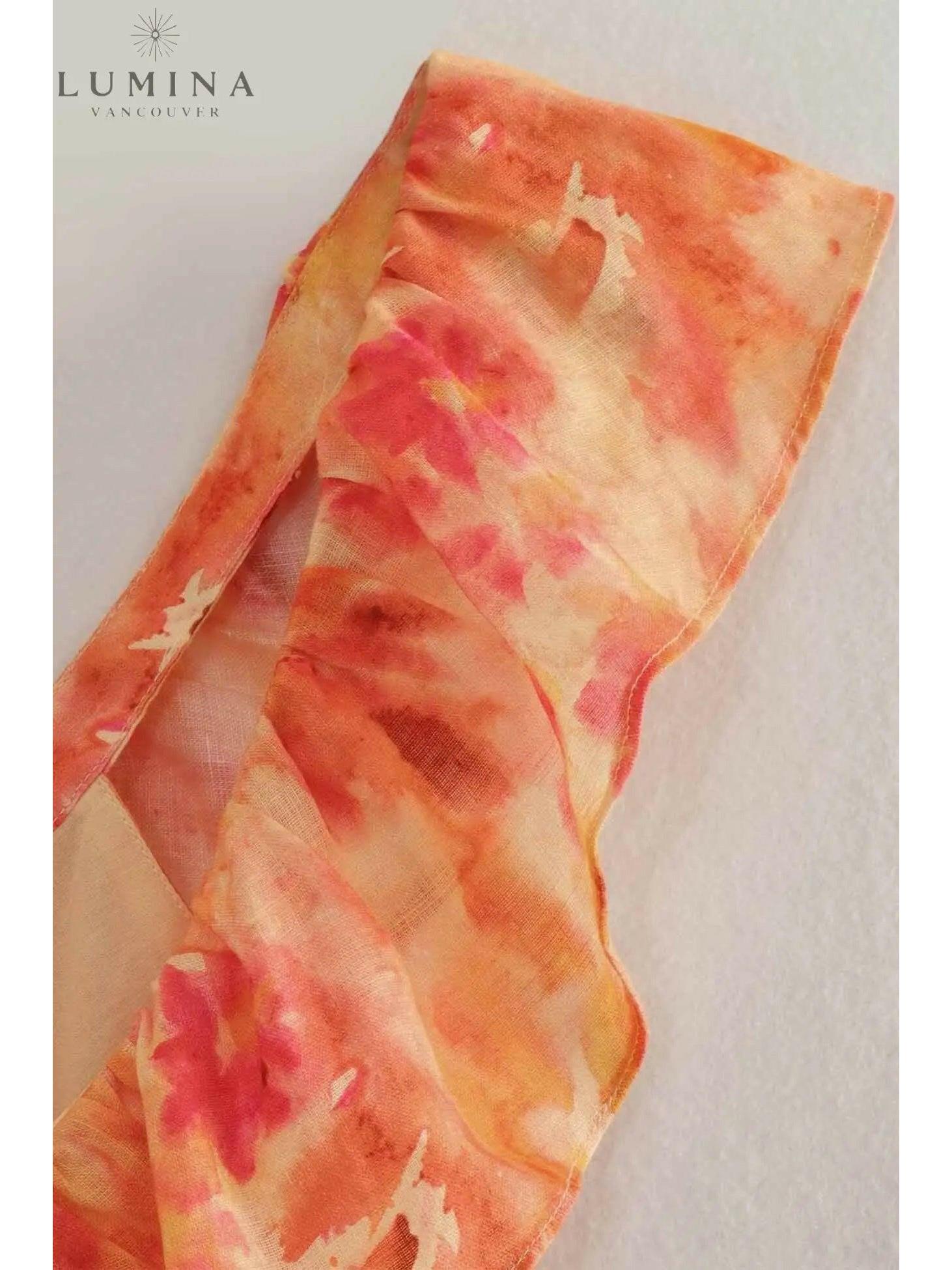 Orange Ariella floral ruffle dress for girls, perfect for holiday vibes, by Lumina Vancouver, size 4-6XS.