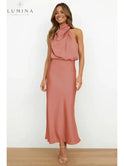 Black Ashley cocktail dress by Lumina Wear, elegant evening dress with a fitted silhouette, perfect for wedding guests.