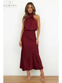 Black Ashley cocktail evening dress by Lumina Wear, featuring a stylish design perfect for wedding guest attire.