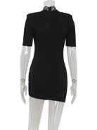 Black mini dress with bodycon fit by Lumina Vancouver, featuring a sleek, fitted silhouette perfect for stylish occasions.