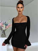 White Astraeon bodycon mini dress with ruched details from Lumina Wear, shown on a model. Perfect for stylish evening wear.